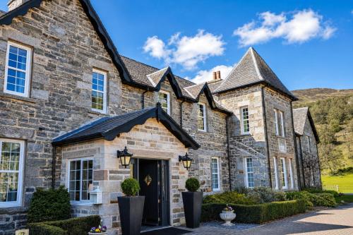 Зовнішній вигляд готелю, Dunalastair Hotel Suites in Kinloch Rannoch