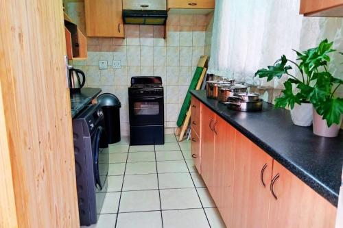 Kitchen, Budget Stays at Olivia Pines Guesthouse in Krugersdorp