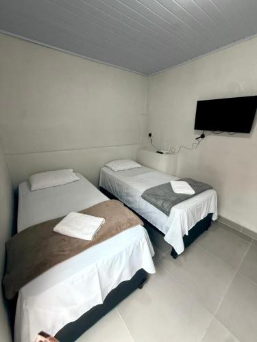 المرافق, Kitnet simples com banheiro privativo e ar condicionado in Praia do Tombo