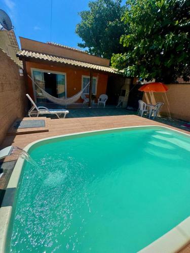 Casa com piscina a 100 metros da praia – khách sạn tại Unamar