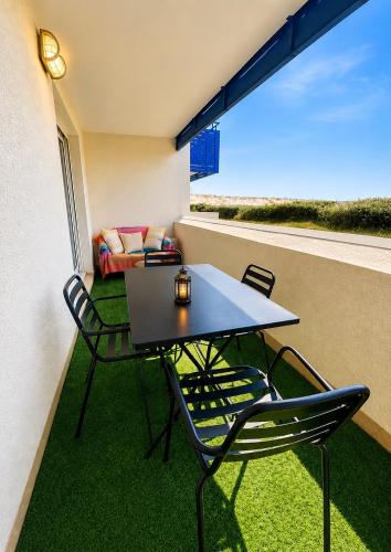 Charmant appartement en front de mer avec piscine