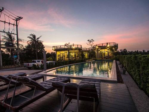 Swimming pool, L'air Du Pran Resort in Pranburi