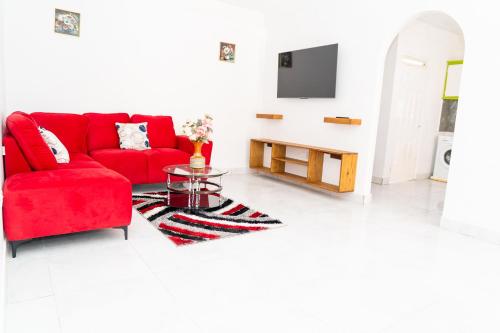 Shared lounge/TV area, Elegant 3BedRoom Luxury Apartment & Car Rentals in Canefield