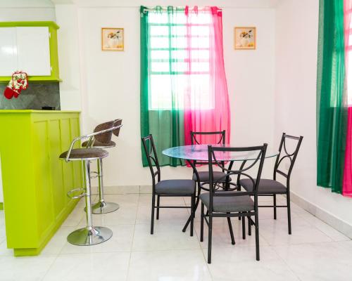 Restaurant, Elegant 3BedRoom Luxury Apartment & Car Rentals in Canefield