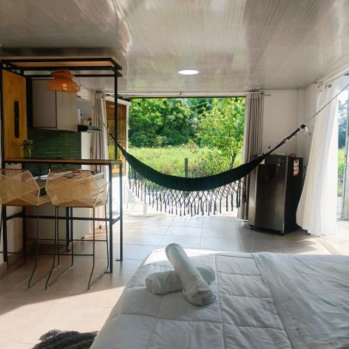 Suite campestre a 5 minutos del parque con aire acondicionado