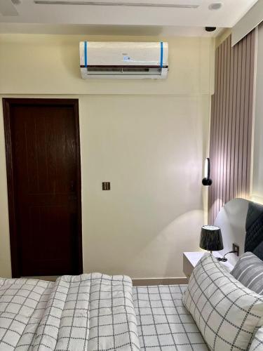 Designer 1BR & 2BR Apartment in DHA With TV & AC - image 9