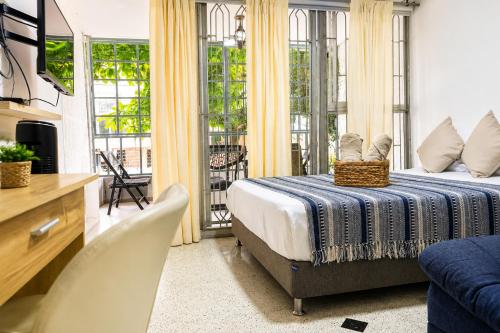 loft cerca a laureles, WIFI, cerca metro y GUARDA EQUIPAJE GRATIS!!