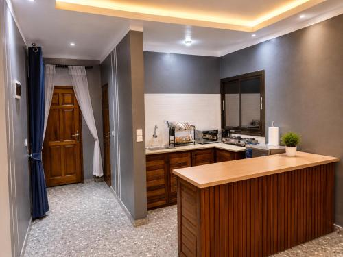 ห้องครัว, Résidence Tango - Appartements Meublés - 4 types (Residence Tango - Appartements Meubles - 4 types) in บาฟูซซัม