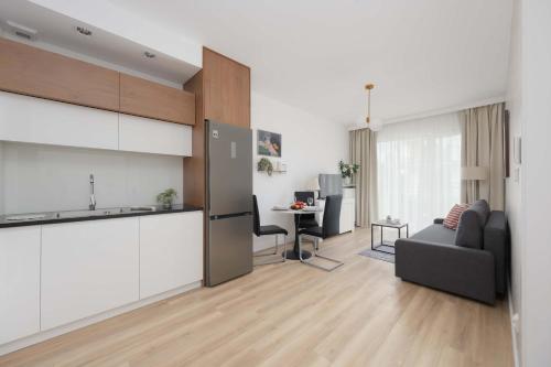 Cozy Apartments with Balcony & Parking in Warsaw by Noclegi Renters - image 4