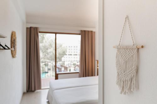 Hostal Palmaria - Tap to explore photos