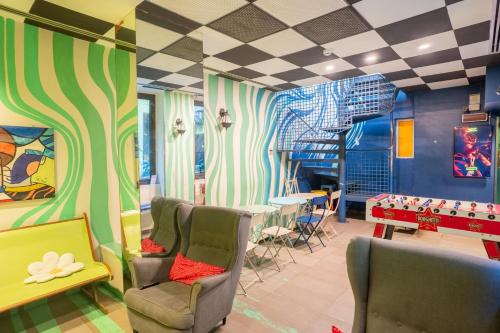 zonă comună salon/TV, Ostello Bello Grande in Milano