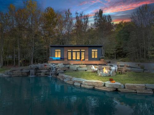 . Tiny House on a Waterfall at Private Tiny Lake