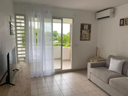 Studio moderne au bord de la mer à Les Abymes - 24 m² – khách sạn tại Baimbridge