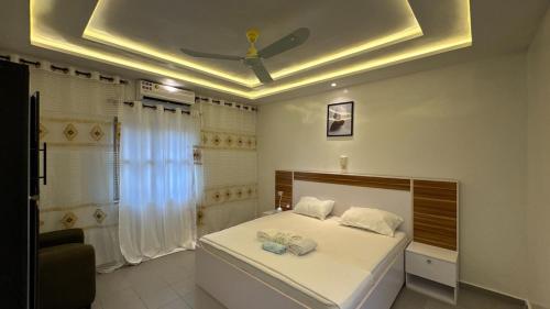 Appartement cosy climatisé - Séjour confortable – khách sạn tại Cococodji