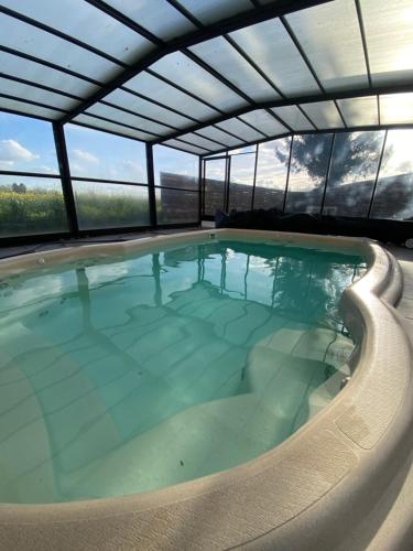 Peldbaseins, Le Cocooning in Asnieres (Upper Normandie)