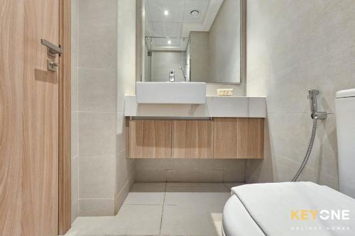 Elegant Living at Azizi Riviera Studio - image 12