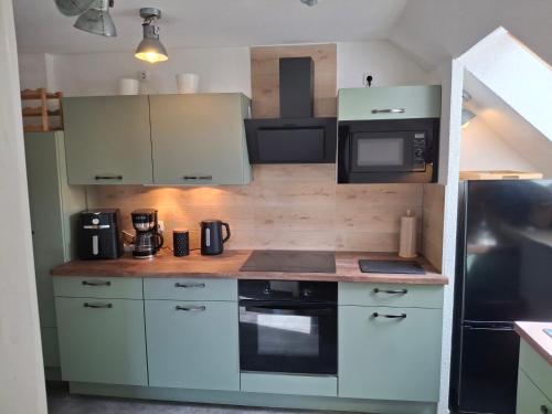 Pauls Hexenhaus Wohnung Brocken – khách sạn tại Stecklenberg