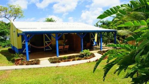 Residence Les Palmiers - Chambre d'hôtes - La Trinité