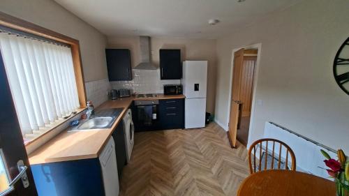 virtuve, Golspie Firthview A cosy seafront escape in Golspija
