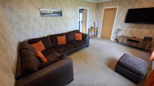 Koplietošanas atpūtas telpa ar TV, Golspie Firthview A cosy seafront escape in Golspija