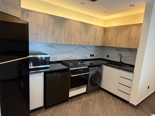 Sleek 1BR Modern Heart of Abdali Amman - image 2