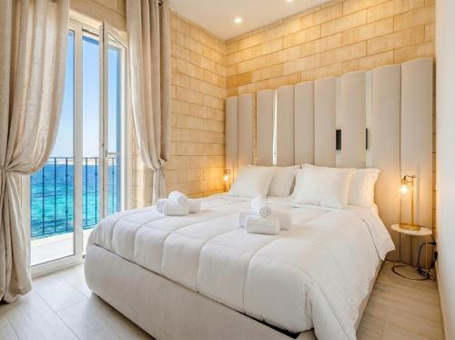 Terra | 2-Bedroom with Shared Kitchen & Balcony – Seafront Location