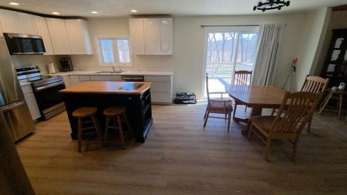 The Gathering House by Otter Tail Lake in Batlleika (MN)