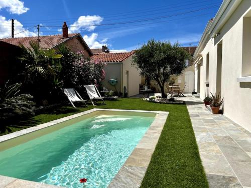 Charmante maison de ville avec piscine plein sud