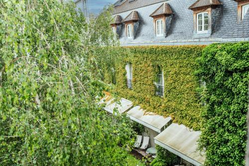 Saint-Germain 110 m2 Parisien Poutres Piano - image 13
