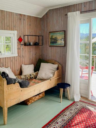 Exterior view, Traditional 60S Cabin By Langasdammen Lake in Levanger