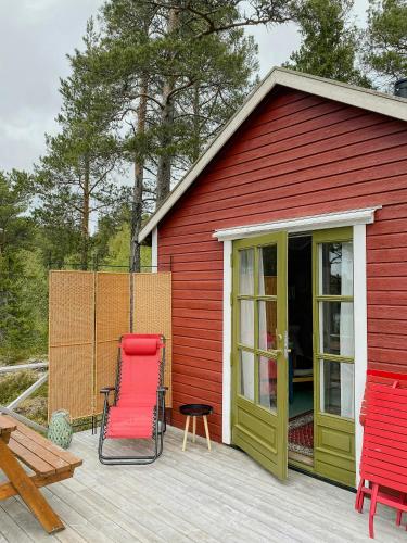Exterior view, Traditional 60S Cabin By Langasdammen Lake in Levanger