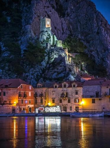 Lovely botel Mala Kate in river Cetina in Omis