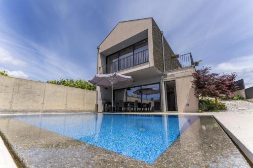 Casa das Branquinhas - Férias no Minho com piscina! – khách sạn tại Correlha