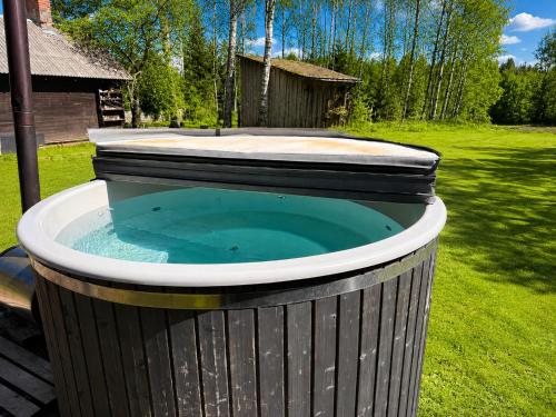 Lake Deer Park Retreat with Hot Tub & Sauna in Talsi