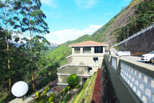 Kert, Abad Copper Castle Hotel in Kannan Devan Domb