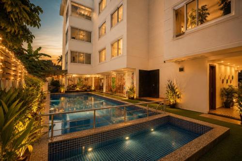Swimming pool, HUE GUH The Porto Candolim in Marra