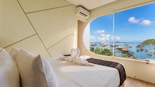 睡床, 巴霍因魯姆酒店 (Inn Room Hotel Bajo) in 下納閩