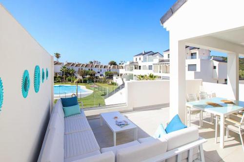 Duplex with ocean views, pool, and beach 100m away