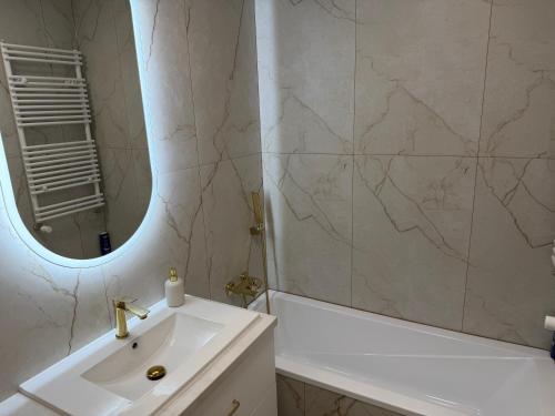Vannas istaba, Apartamenty Villa Piano II in Ostroleka