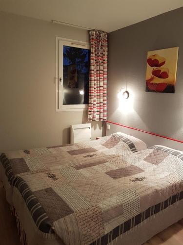 Chambre avec 2 lits