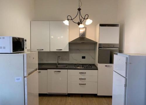 Kitchen, Notti Barocche appartamento 8 posti letto con posto auto in Taranto