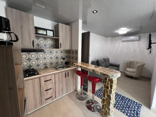 Kitchen, Pereira Airport Suites in San Joaquin