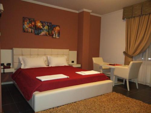 Hotel Mustang Hotel Mustang is conveniently located in the popular Tirana area. The property features a wide range of facilities to make your stay a pleasant experience. Free Wi-Fi in all rooms, 24-hour front desk,