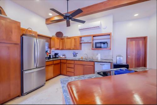 Зовнішній вигляд готелю, Indigo Beach Homes 5A in Амбергріс Кей