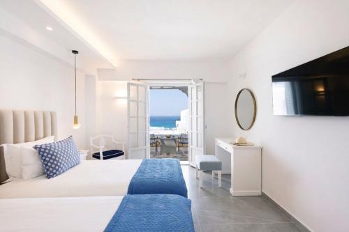 Chambre double avec 1 ou 2 lits, deluxe, vue partielle sur la mer