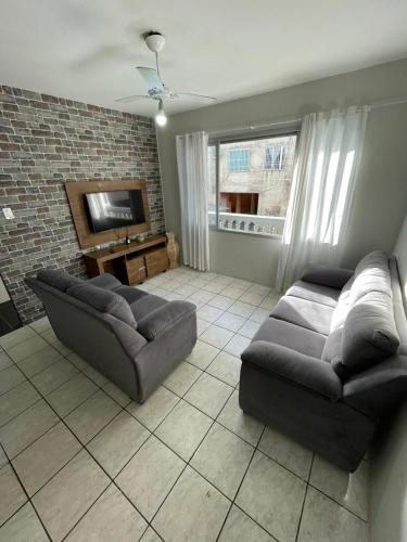Koplietošanas atpūtas telpa ar TV, Apartamento na Praia de Enseada in Sanfrancisko Do Sul