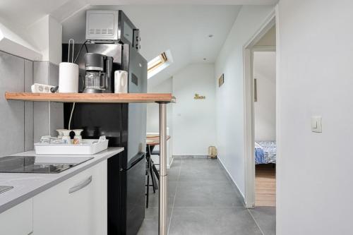 Duplex cosy proche Paris - WiFi - Tout équipé (Duplex cosy proche Paris - WiFi - Tout equipe) in Arnouville