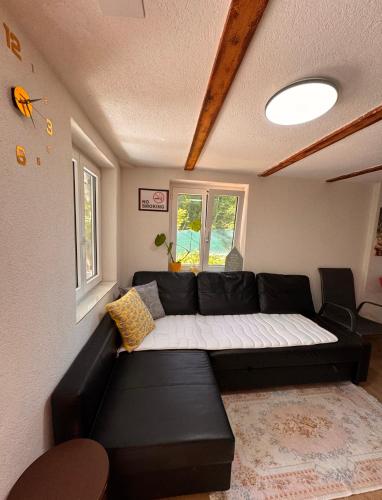 Riverside Cottage near Bern with a Private Garden & BBQ in Ueberstorf
