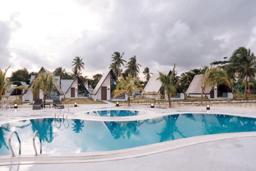 Swimming pool, Kawaland Glamping Resort in Trikora Beach