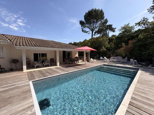 Villa spacieuse avec piscine chauffée, jardin et terrasse à Petit-Piquey - FR-1-736-9 gîte à louer Forêt Domaniale de Lège et Garonne